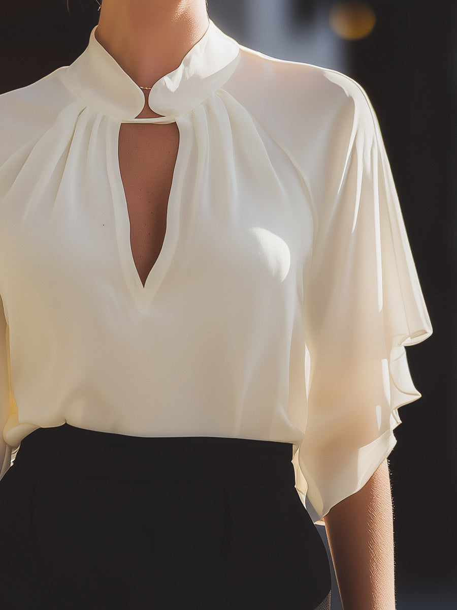 High-Neck Keyhole Blouse With Flutter Sleeves And Soft Gathered Detail